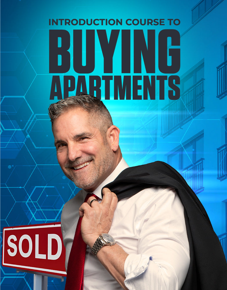 Grant Cardone holding his jacket in front of an apartment building with a sold sign, promoting the Introduction to Buying Apartments multifamily real estate investing course.